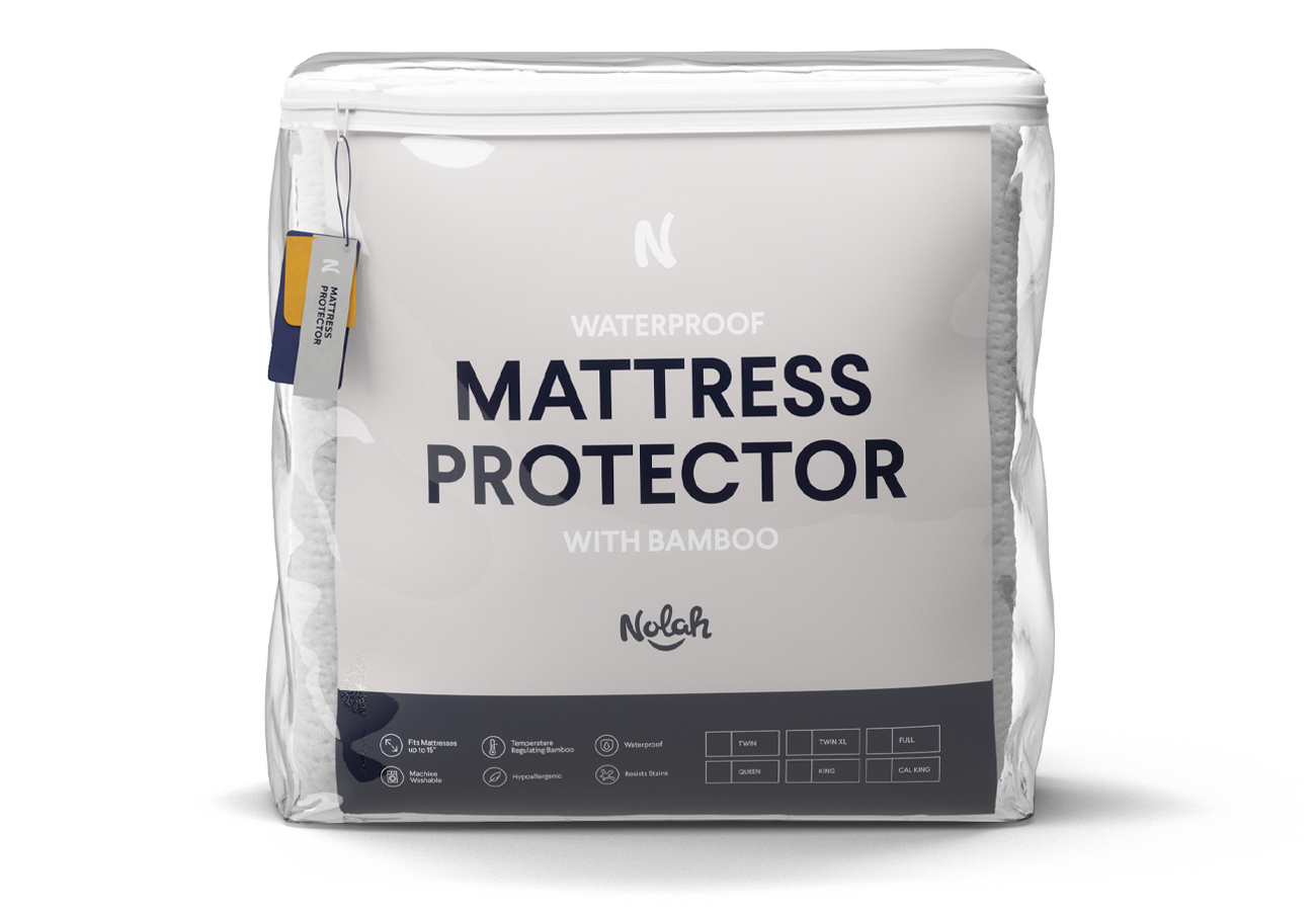 https://www.nolahmattress.com/_next/image?url=https%3A%2F%2Fcdn.shopify.com%2Fs%2Ffiles%2F1%2F1078%2F6718%2Fproducts%2FNolahBambooMattressProtector-ProductImage1300x900px-Image1.png%3Fv%3D1631086921&w=3840&q=75